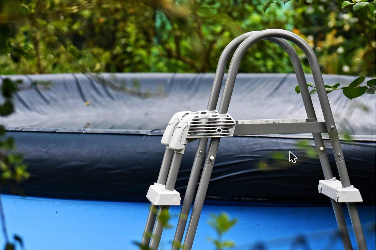 Pool cover and ladder, ready for the off-season